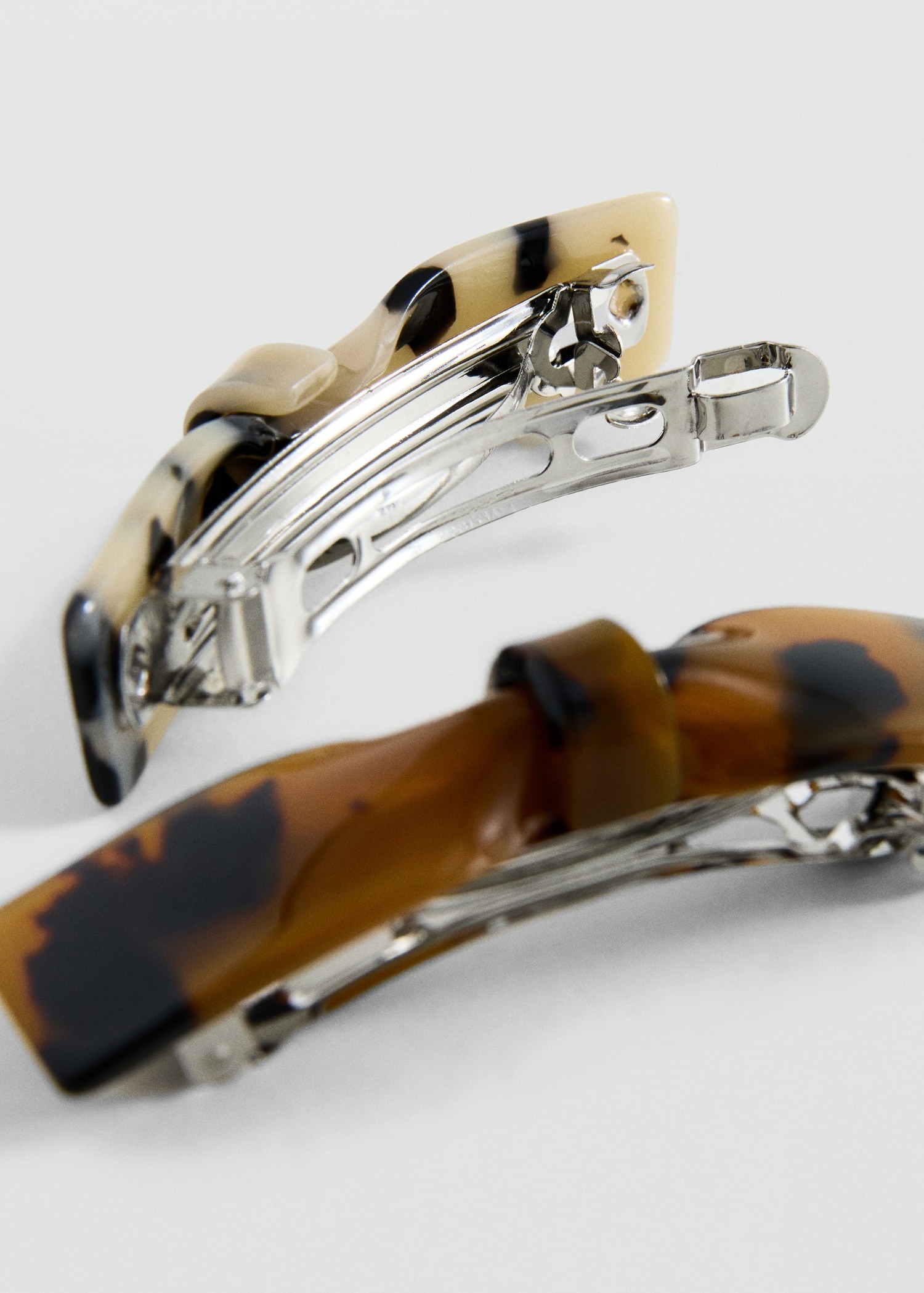 Kapëse flokësh, Mango