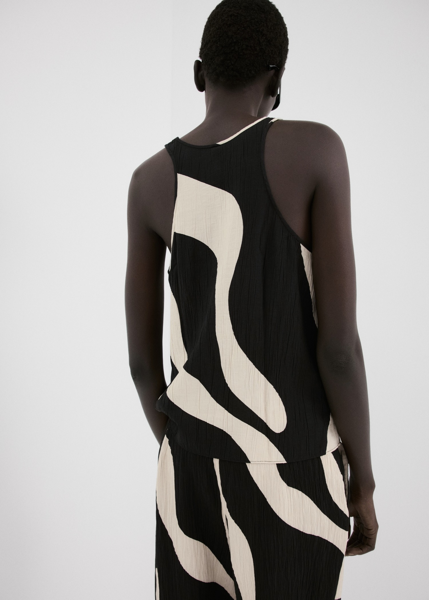 Kanatiere me printe, Mango