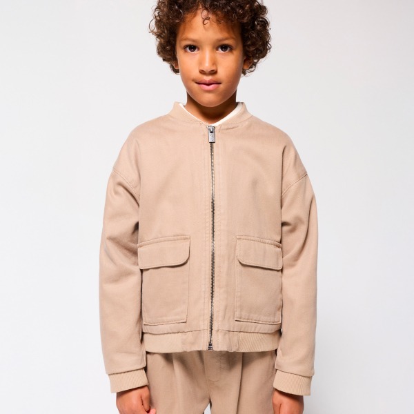 Xhaketë për djem, Okaidi