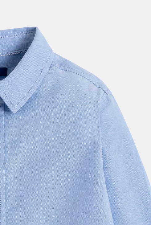 Këmishë për djem, Okaidi