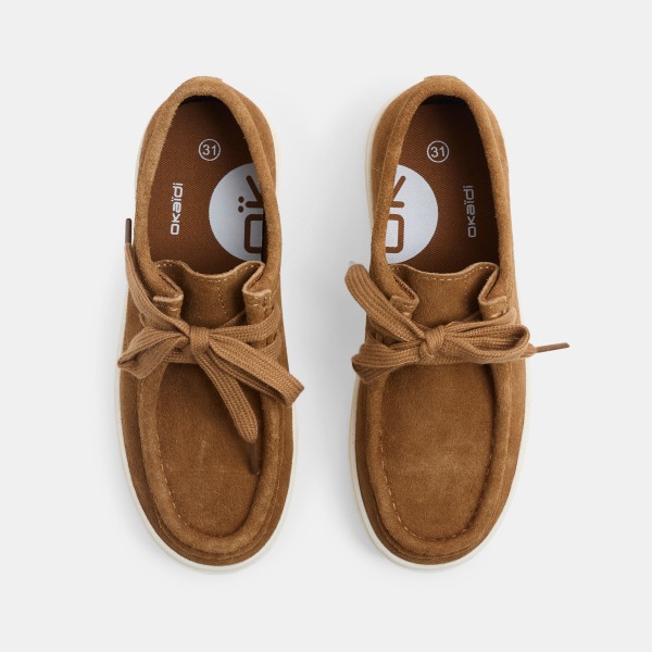 Mokasino për djem, Okaidi