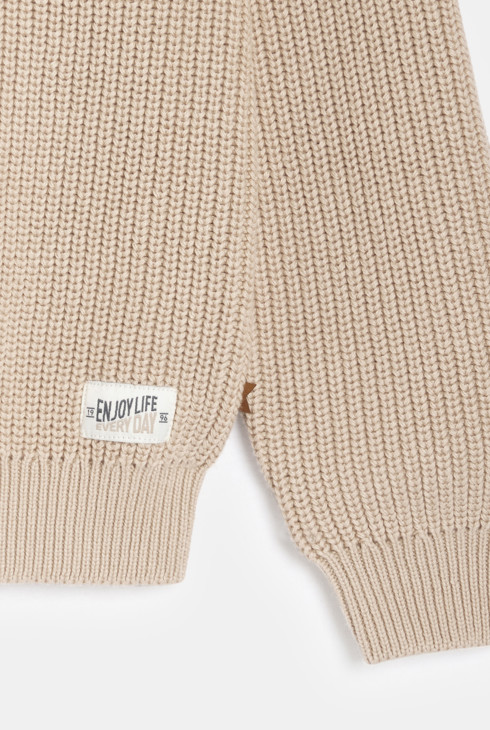 Pulovër për djem, Okaidi