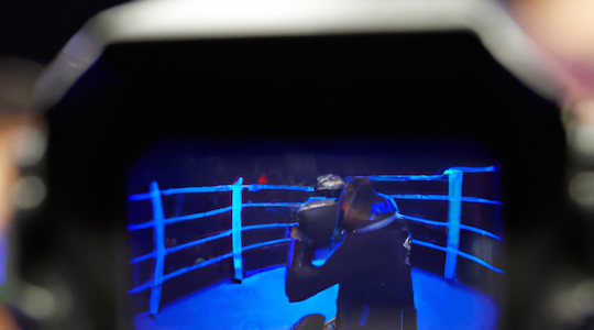video camera recording a boxing ring