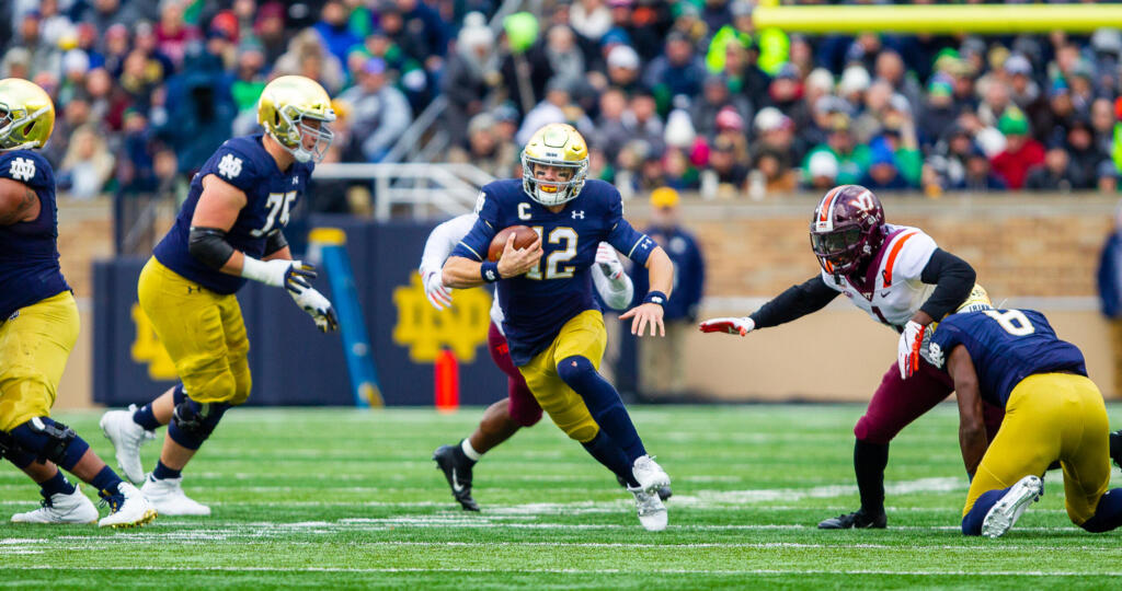 Ian Book rushes against Virginia Tech.
