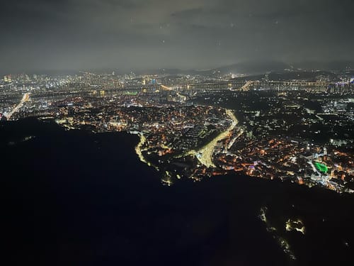 View of Seoul at night from the top of N Seoul Tower