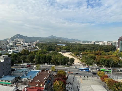 View of Seoul from the top of Makercity Sewoon, Jongmyo in the background.