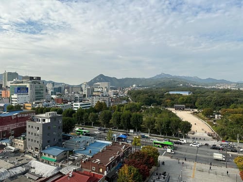 View of Seoul from the top of Makercity Sewoon, Jongmyo in the background.