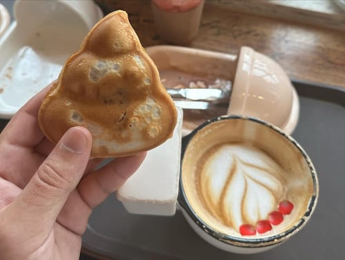 The infamous poop-inspired coffee shop, the cup is a little private hahaha, the plates are in the shape of those old Asian toilets