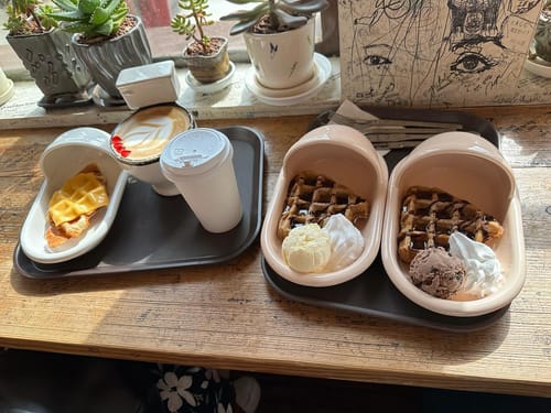 The infamous poop-inspired coffee shop, the cup is a little private hahaha, the plates are in the shape of those old Asian toilets