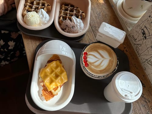 The infamous poop-inspired coffee shop, the cup is a little private hahaha, the plates are in the shape of those old Asian toilets