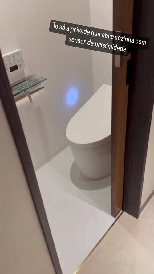 Look at that toilet seat that opens by itself with a proximity sensor