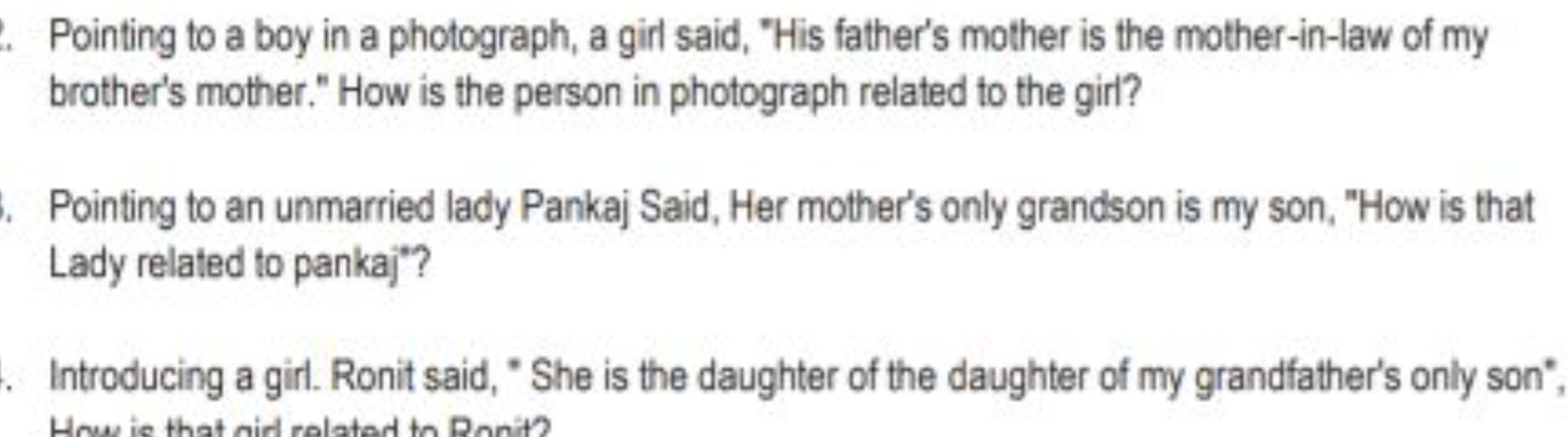 Pointing to a boy in a photograph, a girl said, "His father's mother i