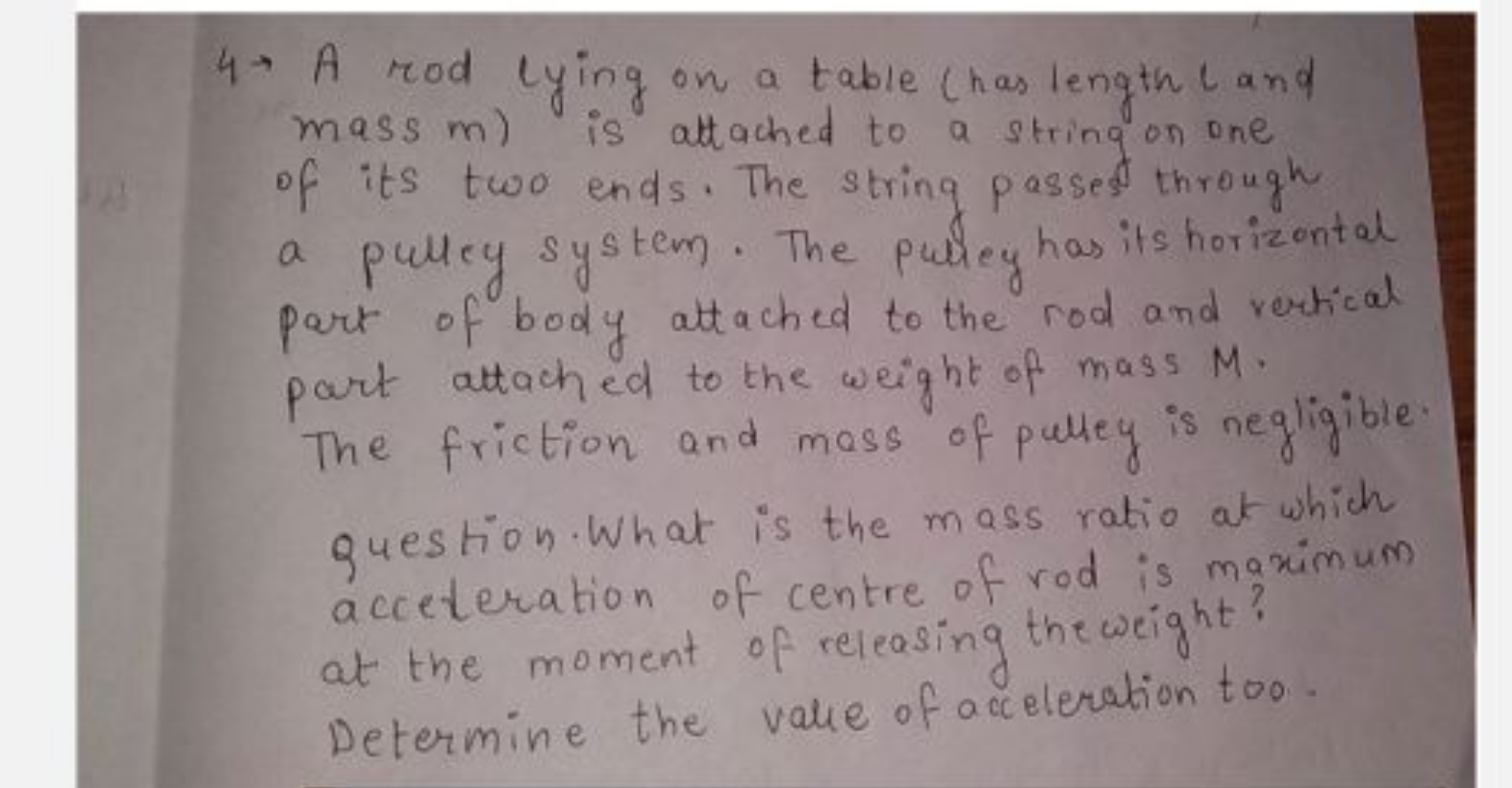 4 → A rod lying on a table (has length l and mass m) is attached to a 