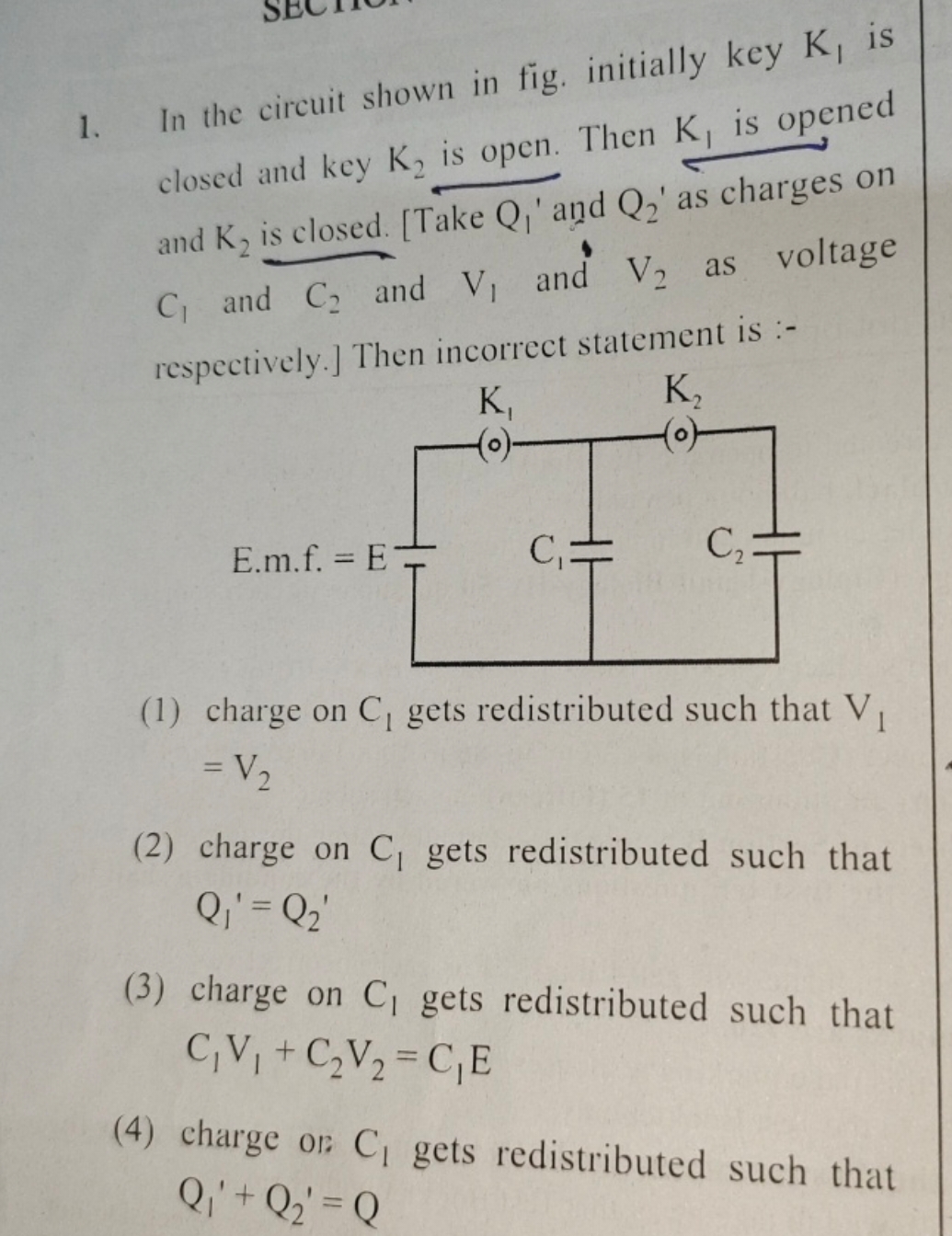 1. In the circuit shown in fig. initially key K1​ is closed and key K2