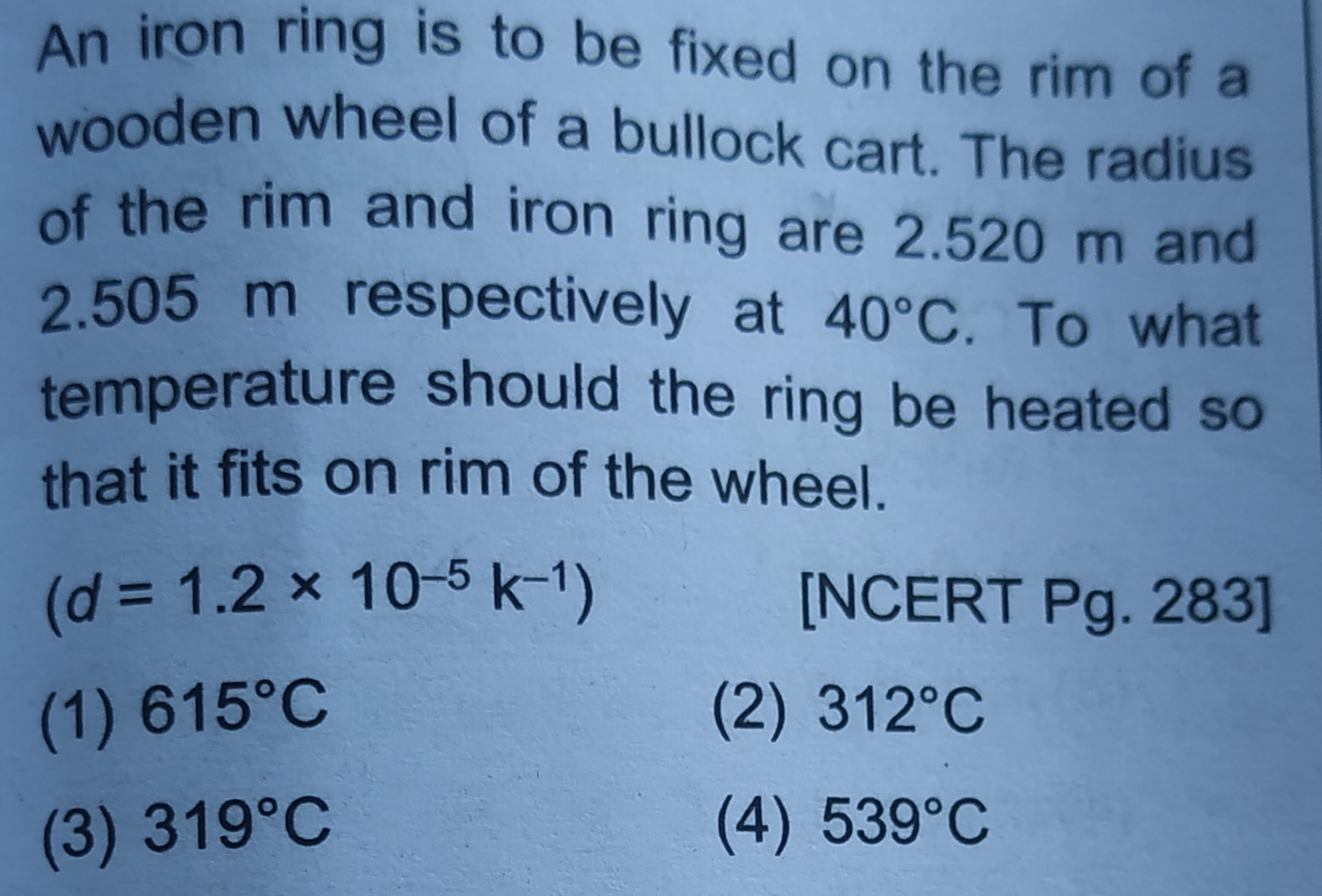 An iron ring is to be fixed on the rim of a
wooden wheel of a bullock 