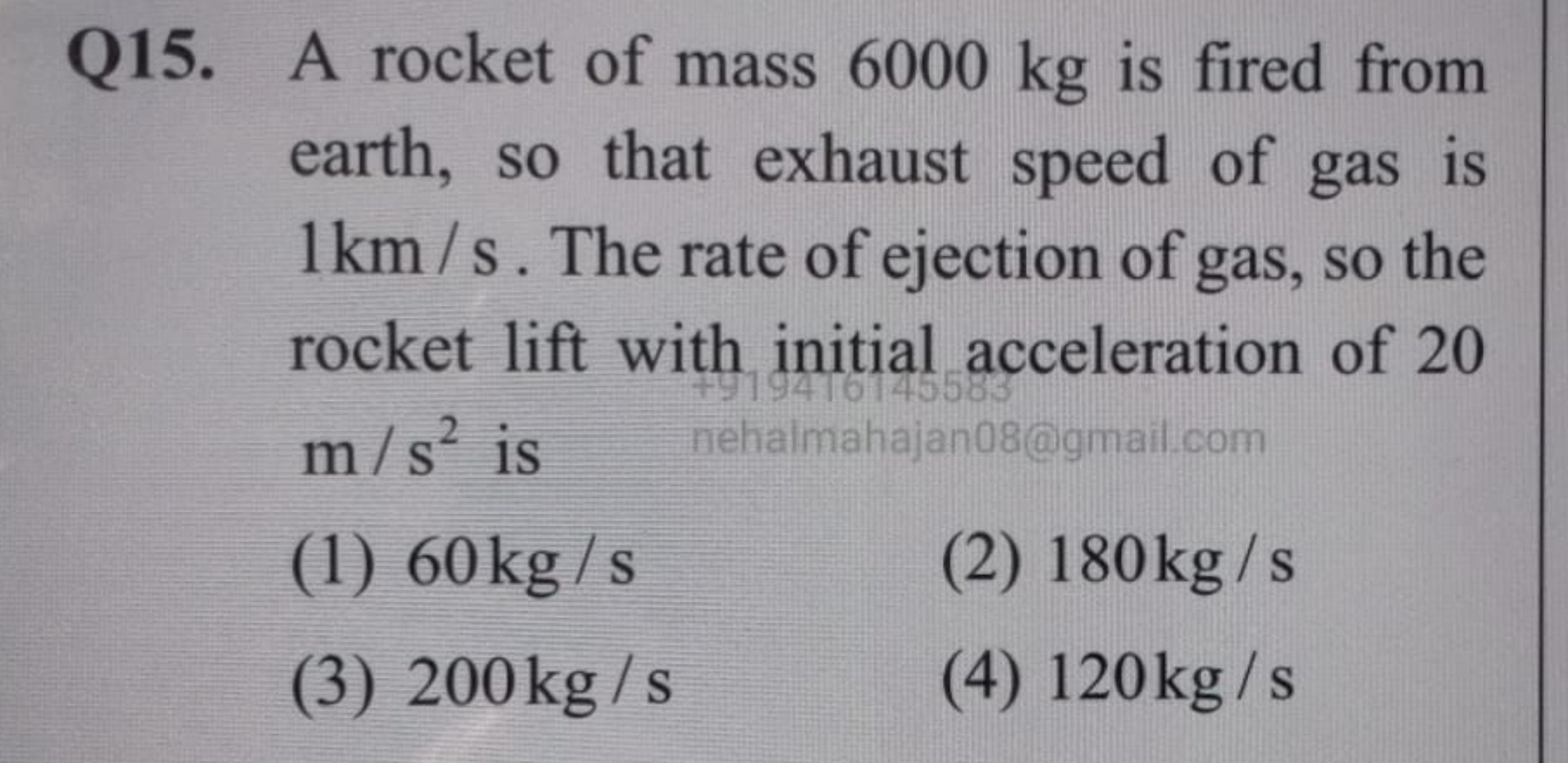 Q15. A rocket of mass 6000 kg is fired from earth, so that exhaust spe