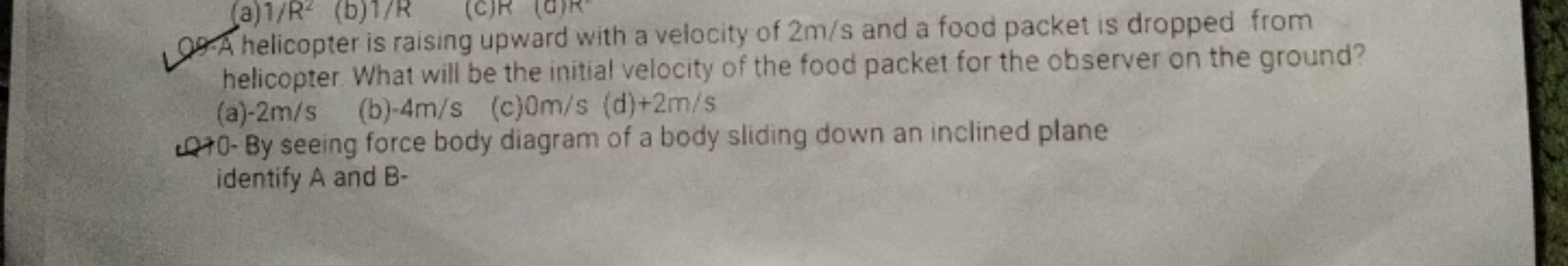 Q8.A helicopter is raising upward with a velocity of 2 m/s and a food 