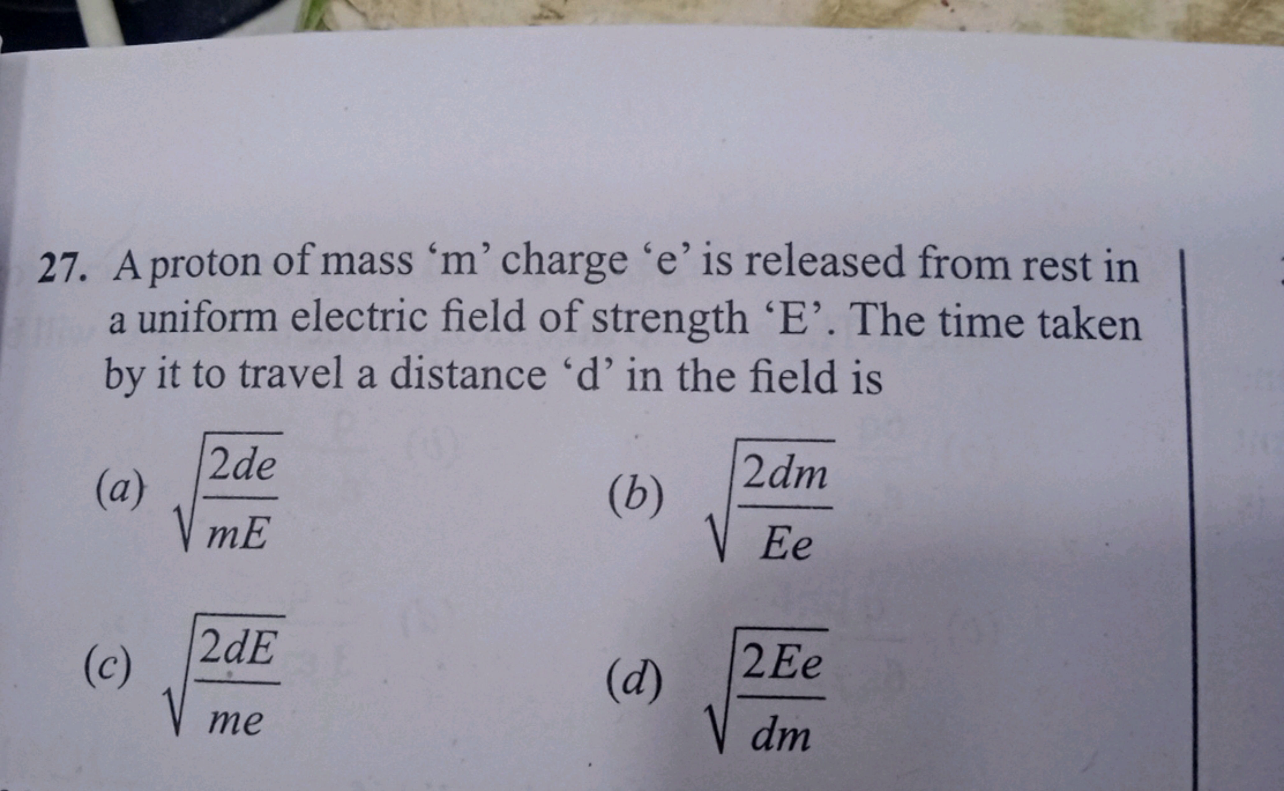 27. A proton of mass ' m ' charge ' e ' is released from rest in a uni