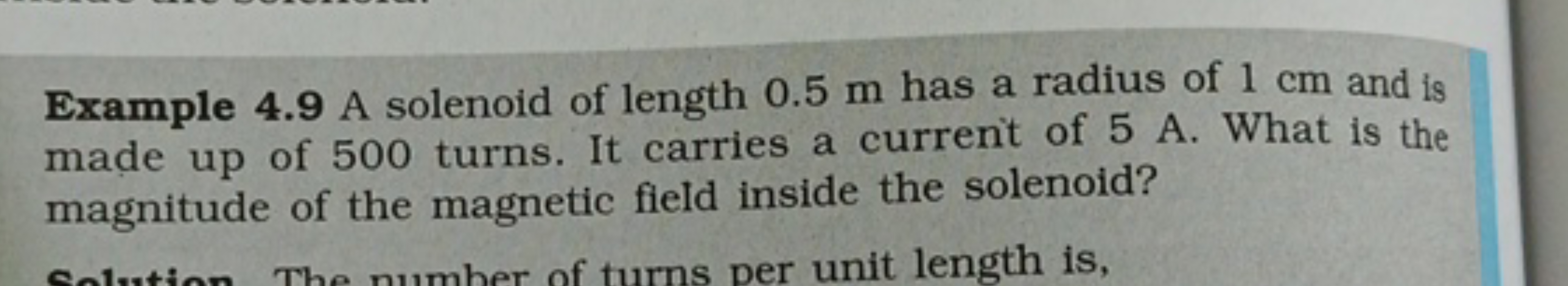 Example 4.9 A solenoid of length 0.5 m has a radius of 1 cm and is mad