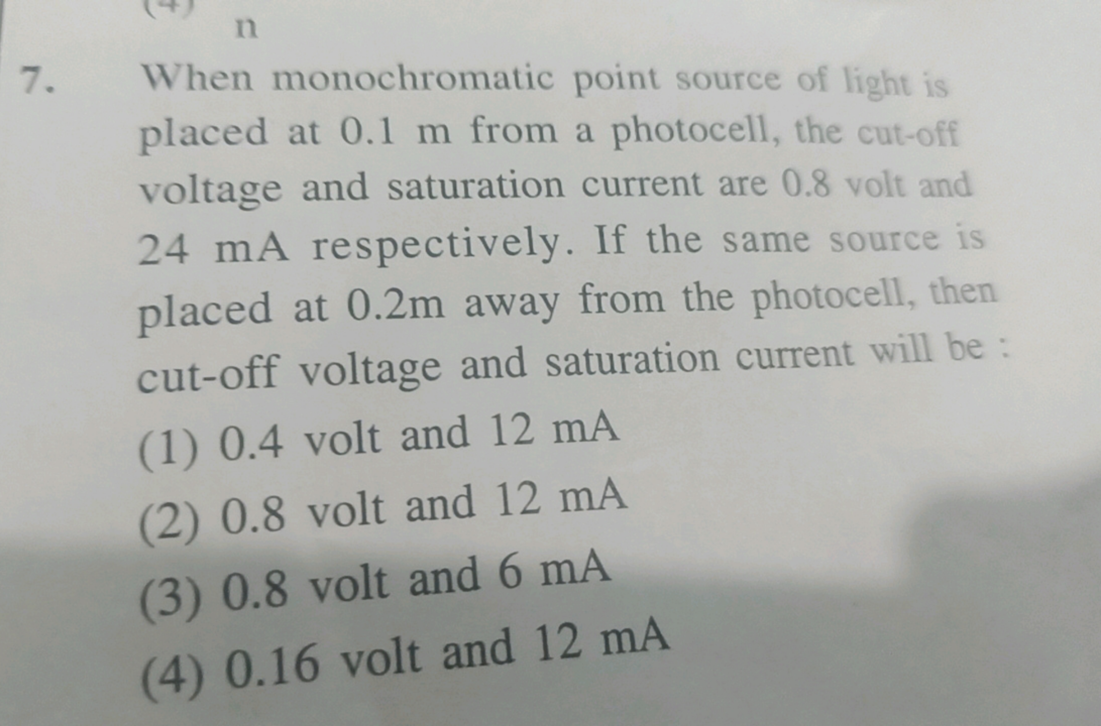 7. When monochromatic point source of light is placed at 0.1 m from a 