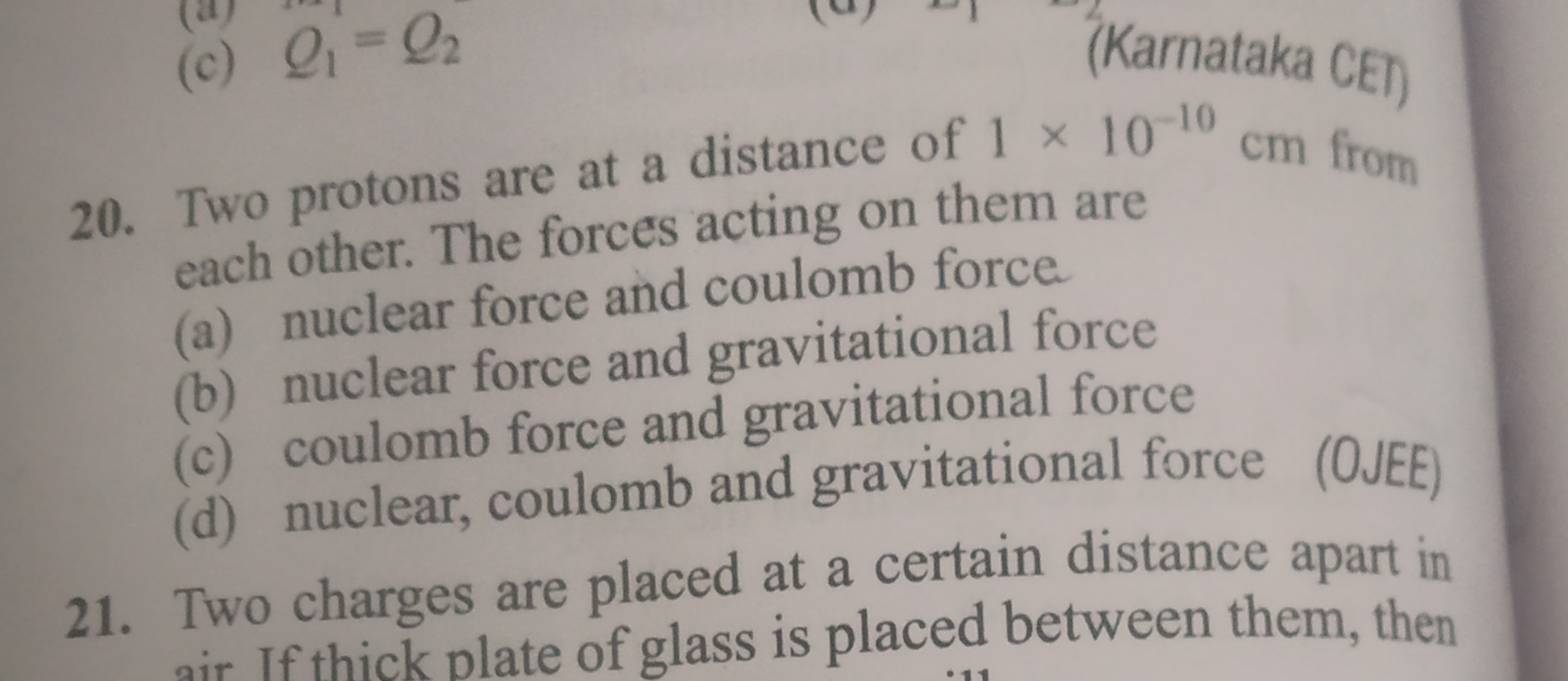 (c) Q1​=Q2​
(Karnataka CET)
20. Two protons are at a distance of 1×10−