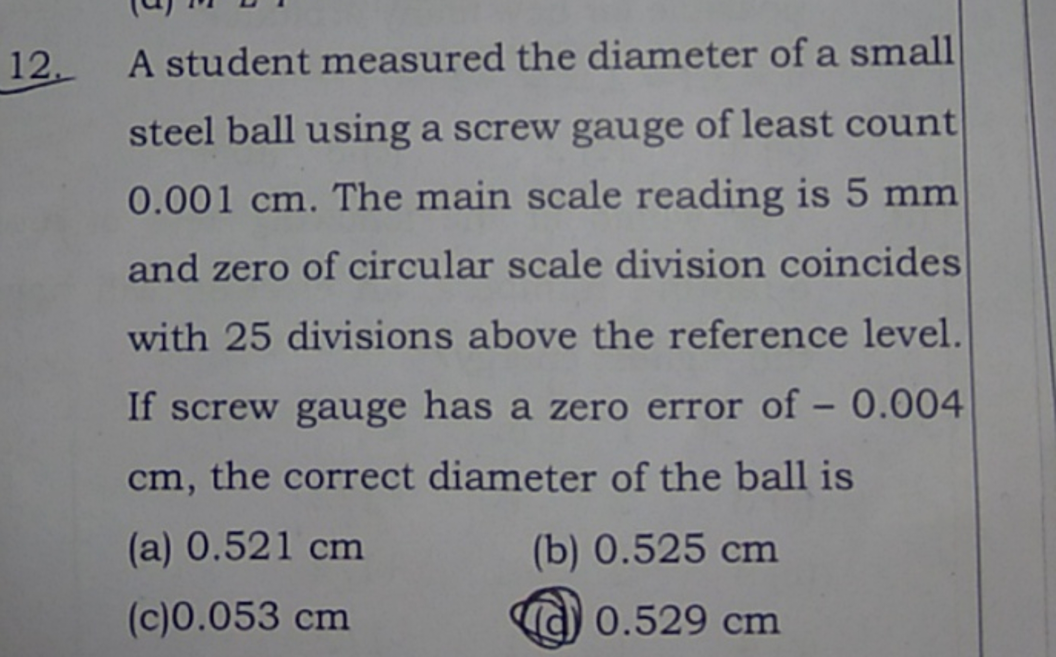 12. A student measured the diameter of a small steel ball using a scre