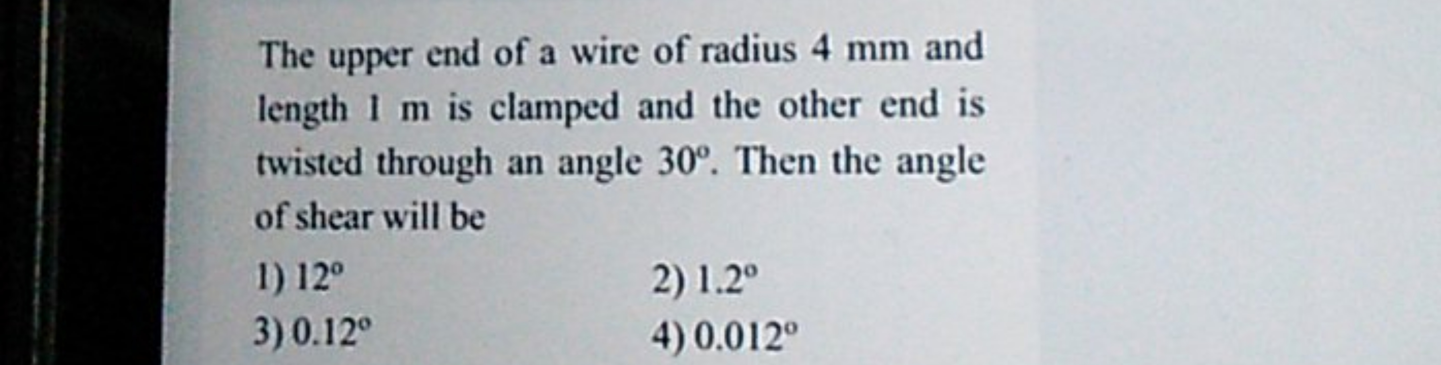 The upper end of a wire of radius 4 mm and length 1 m is clamped and t