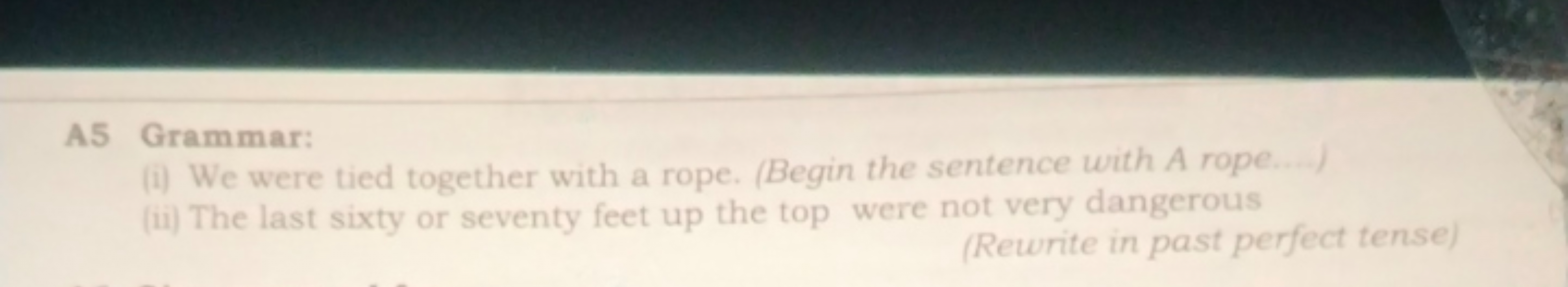 A5 Grammar:
(i) We were tied together with a rope. (Begin the sentence