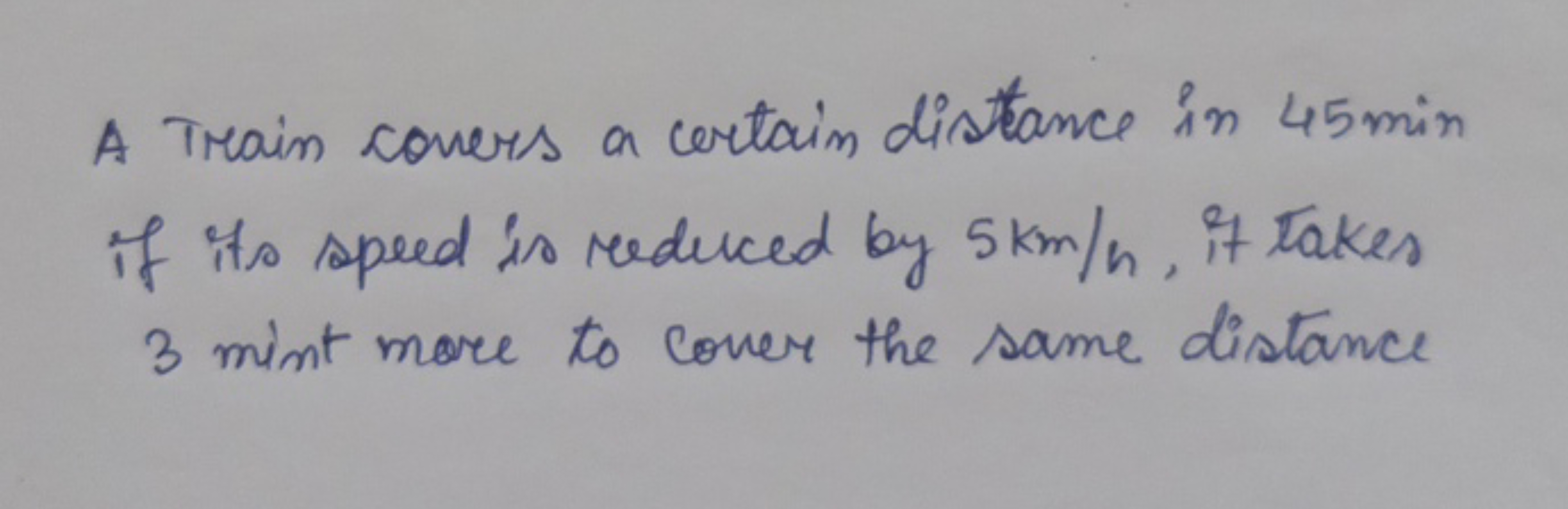 A Train covers a certain distance in 45 min if its speed is reduced by