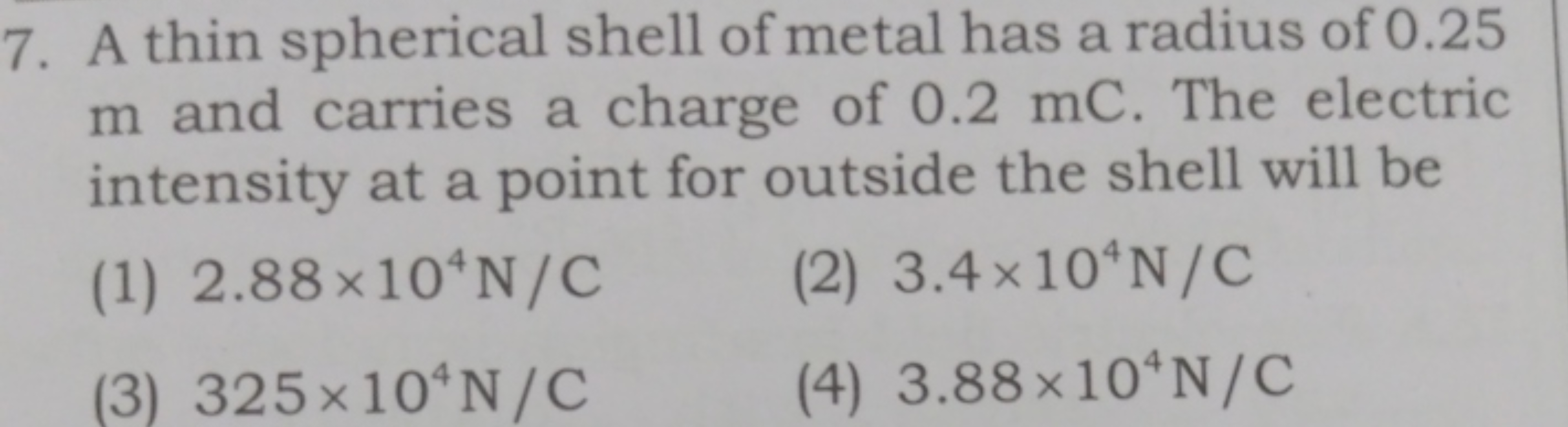 7. A thin spherical shell of metal has a radius of 0.25 m and carries 