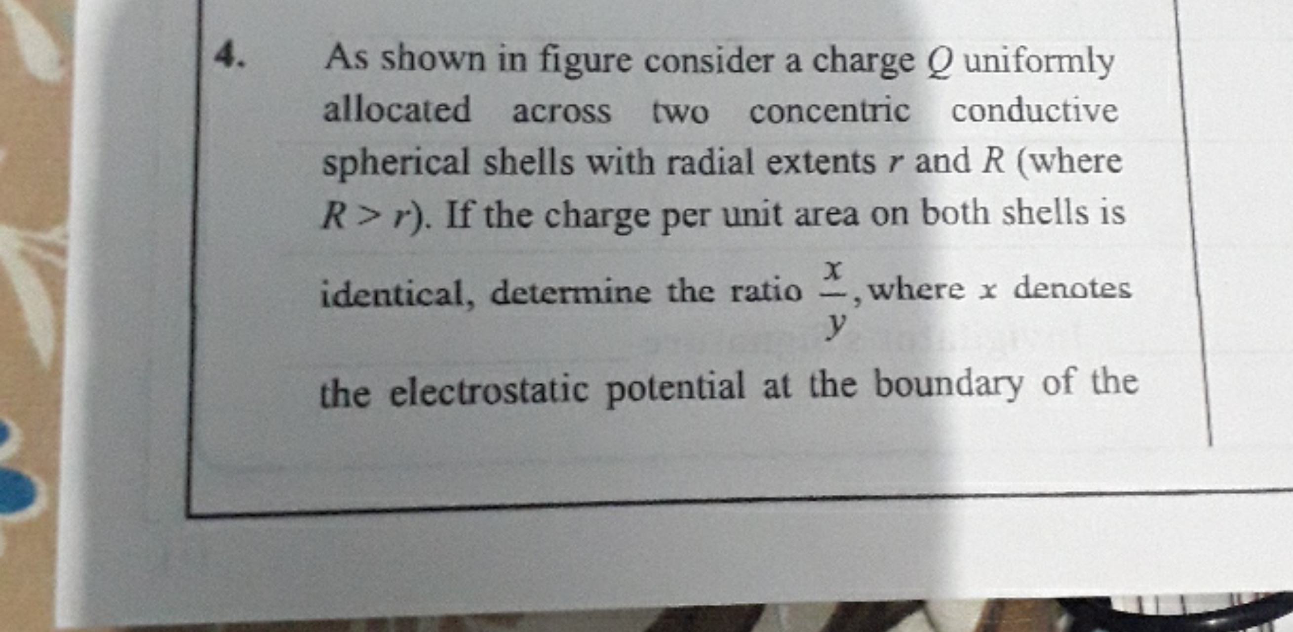 4. As shown in figure consider a charge Q uniformly allocated across t