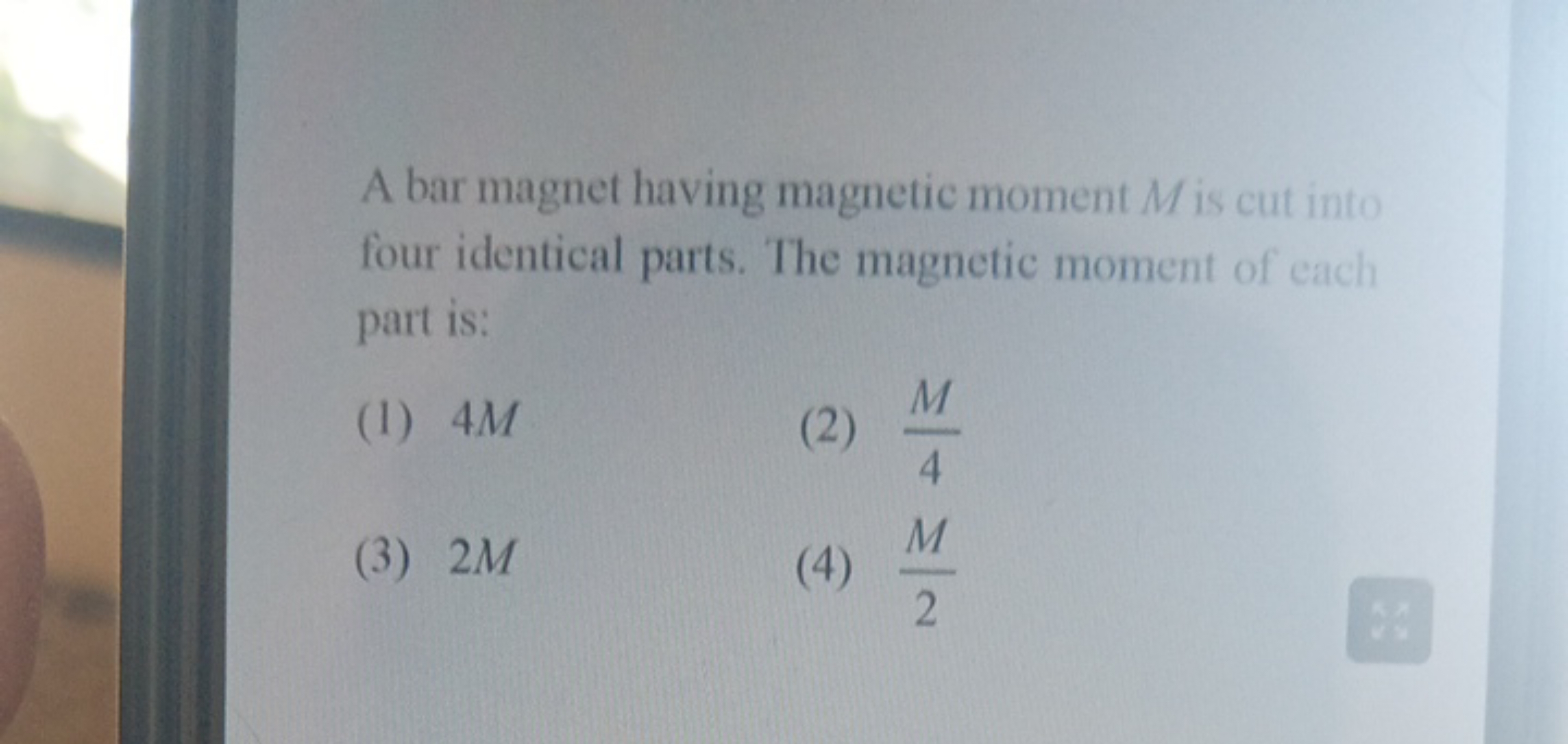 A bar magnet having magnetic moment M is cut into four identical parts