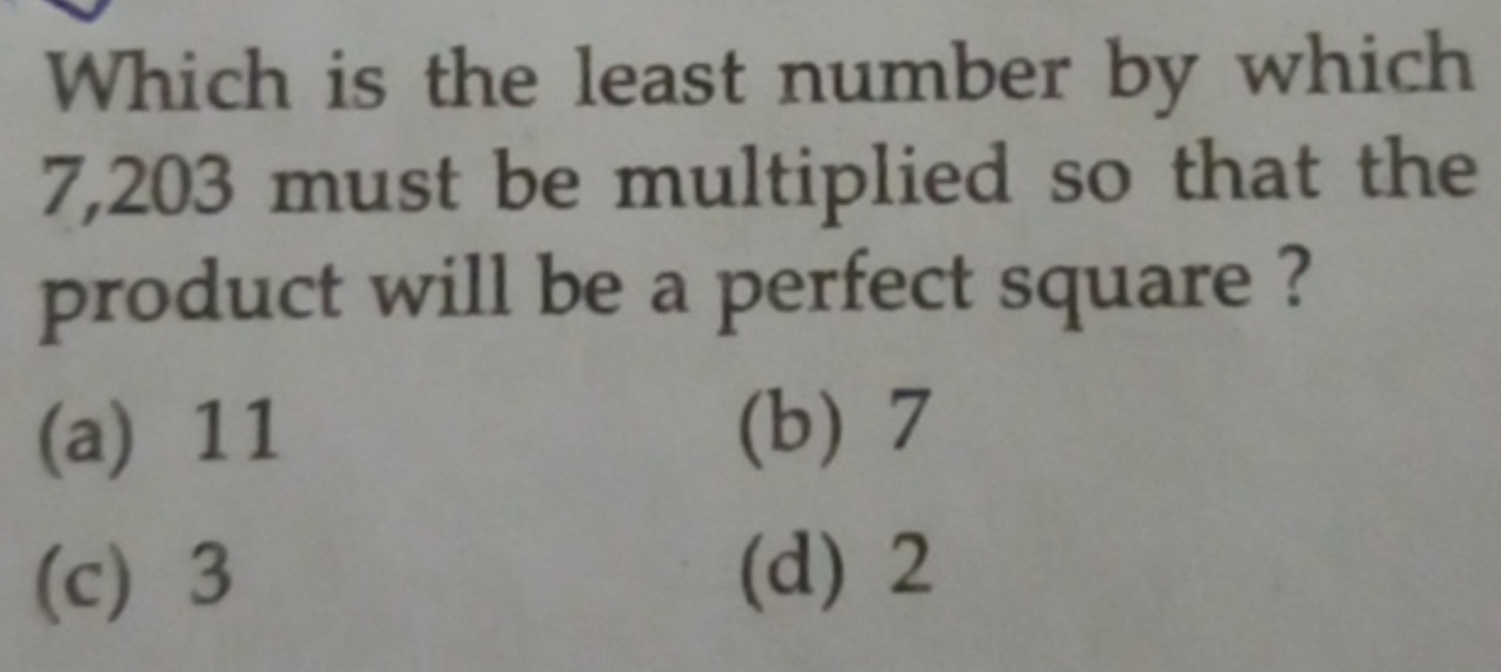 Which is the least number by which 7,203 must be multiplied so that th