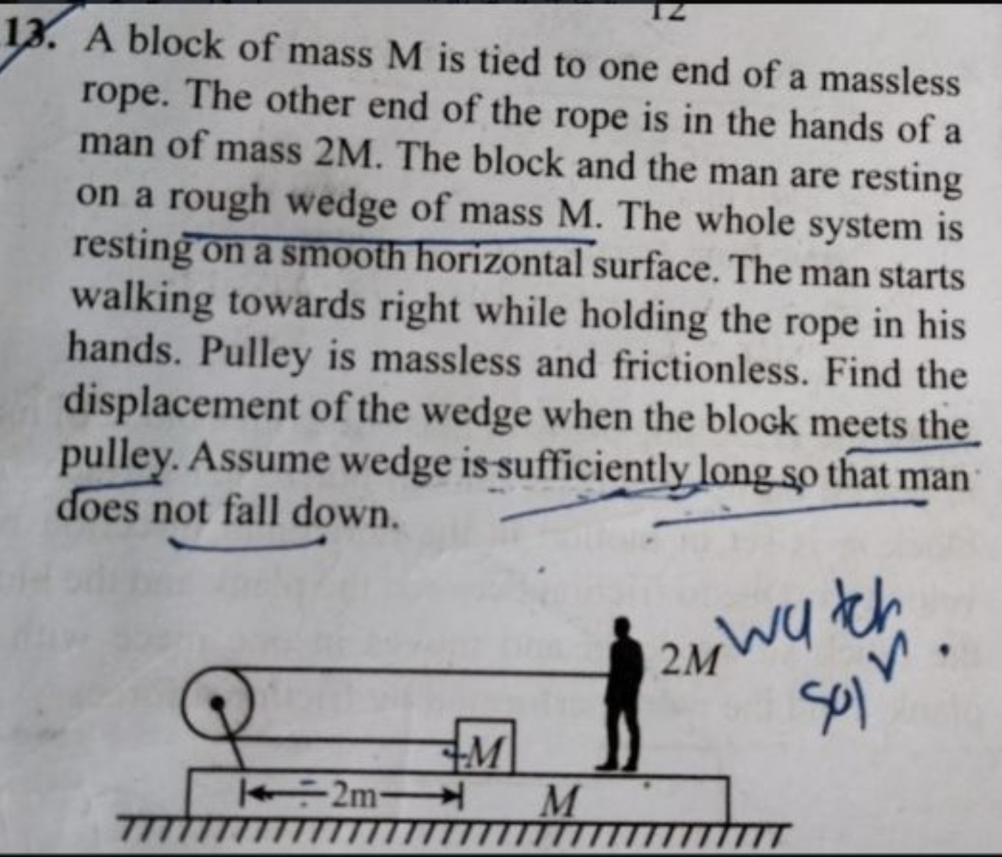 13. A block of mass M is tied to one end of a massless rope. The other