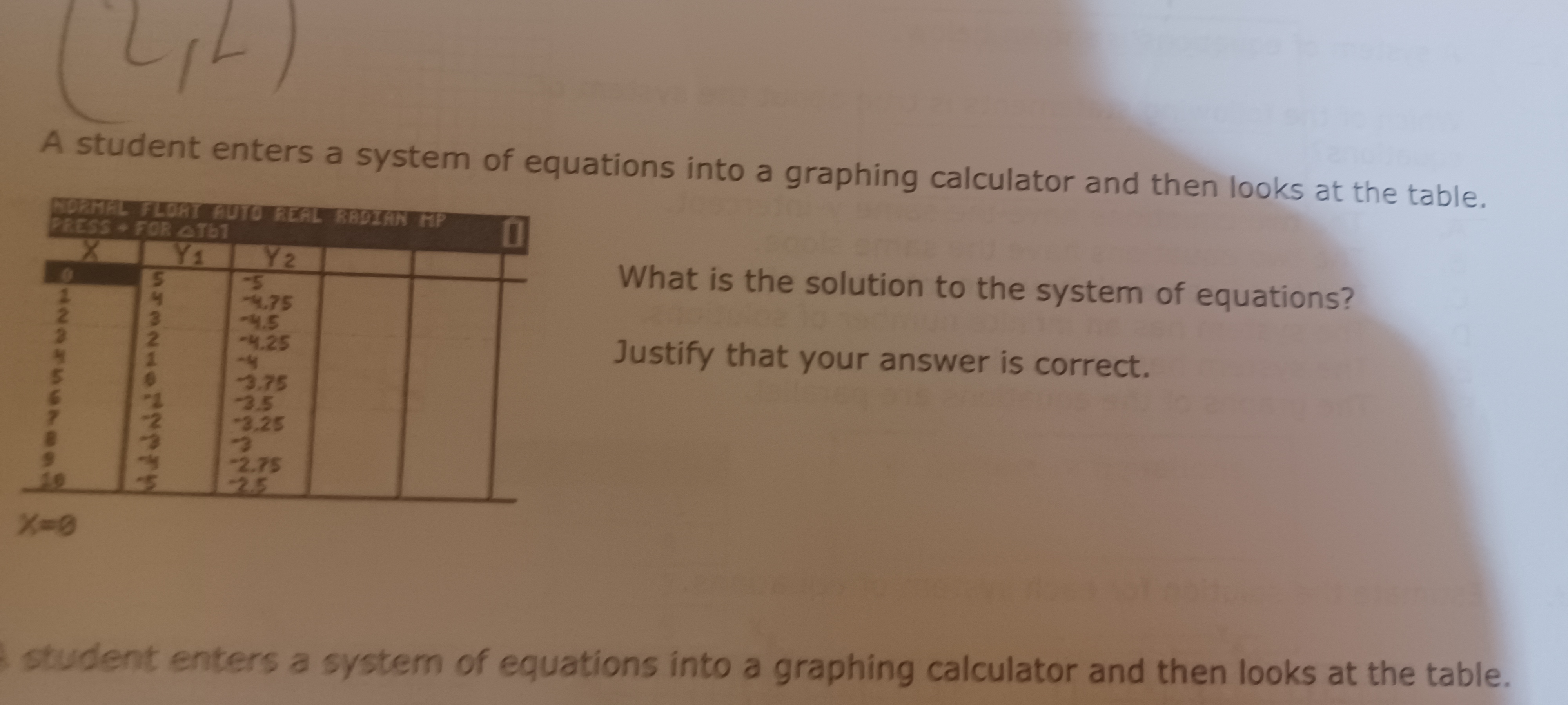 A student enters a system of equations into a graphing calculator and 