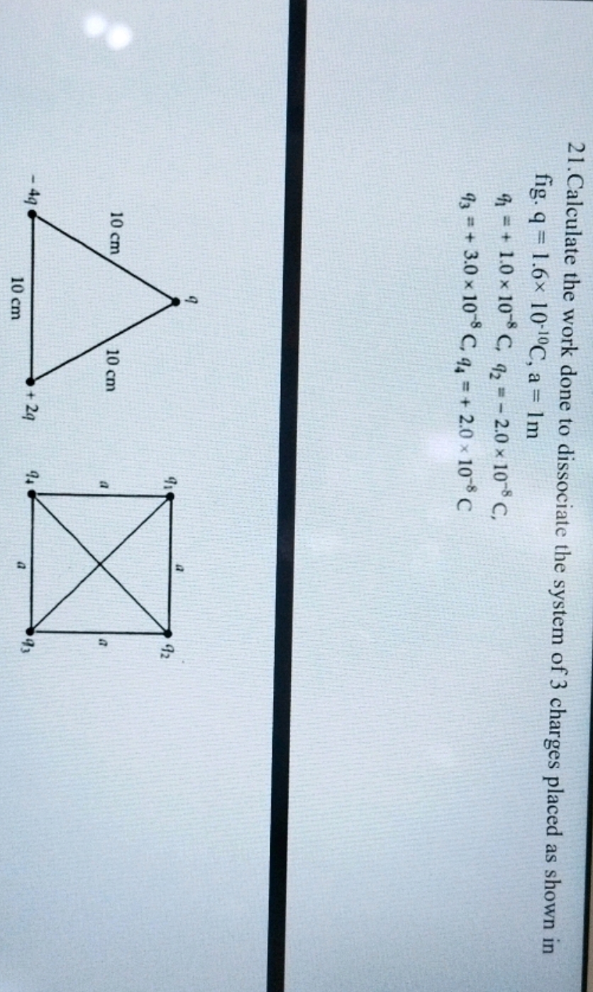 21. Calculate the work done to dissociate the system of 3 charges plac