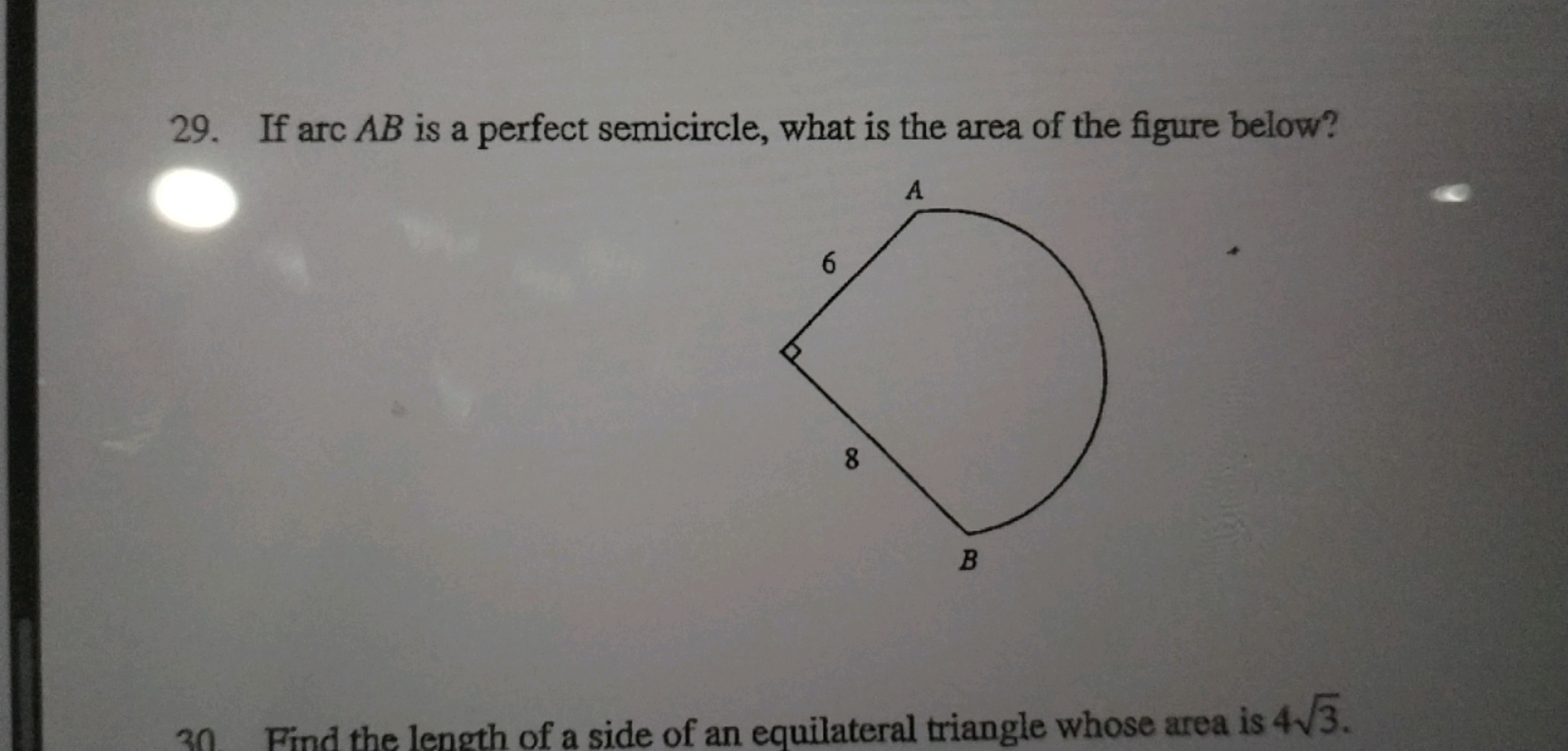 29. If arc AB is a perfect semicircle, what is the area of the figure 