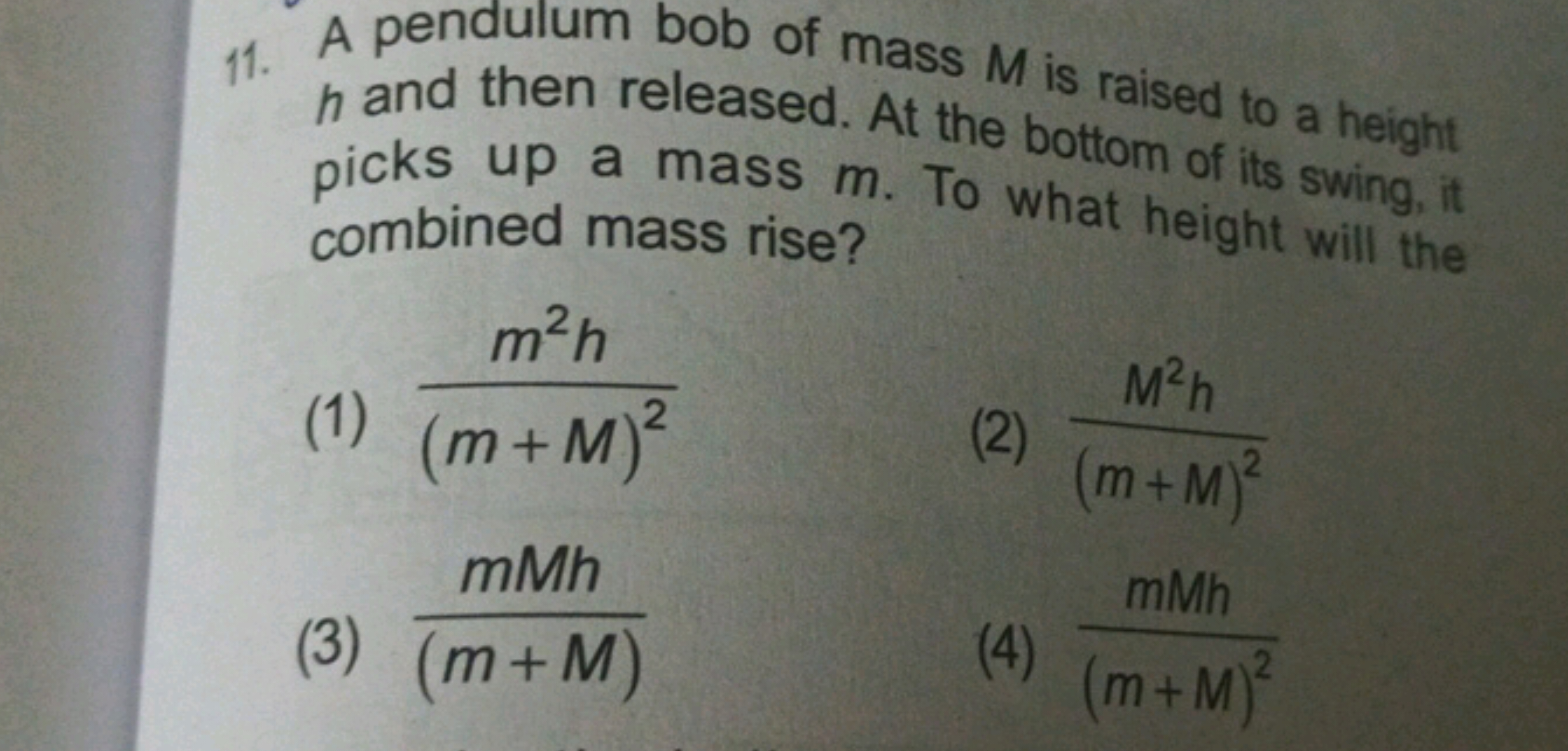 11. A pendulum bob of mass M is raised to a height h and then released