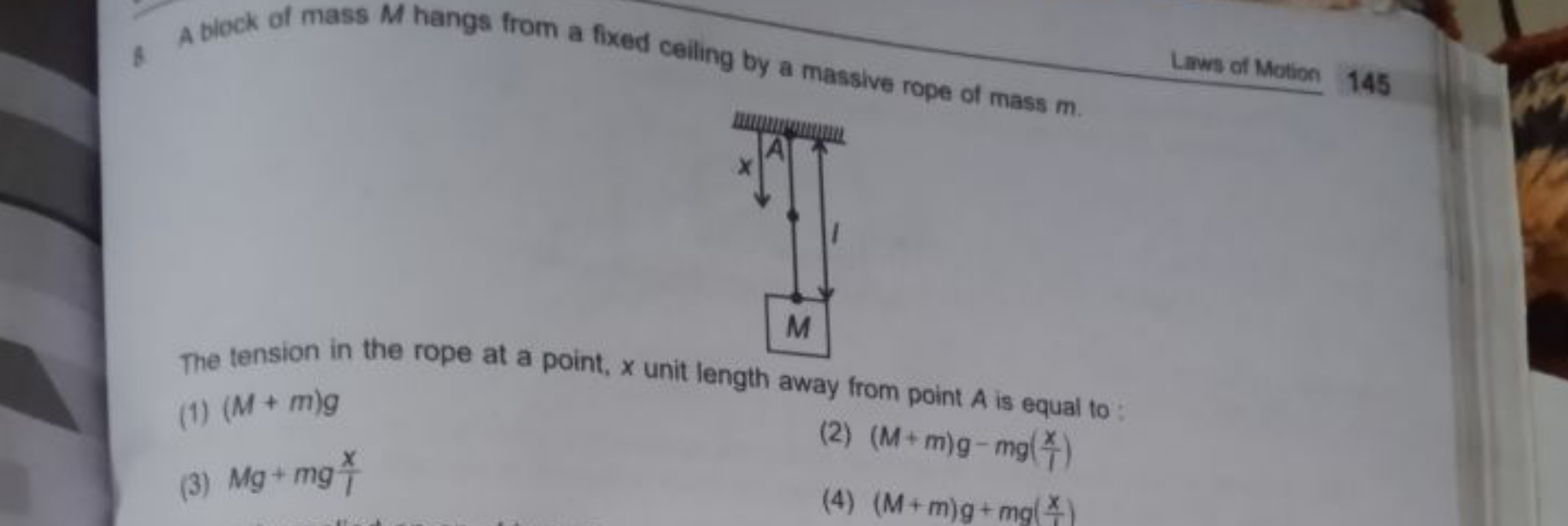 8
A block of mass M hangs from a fixed ceiling by a massive rope of ma