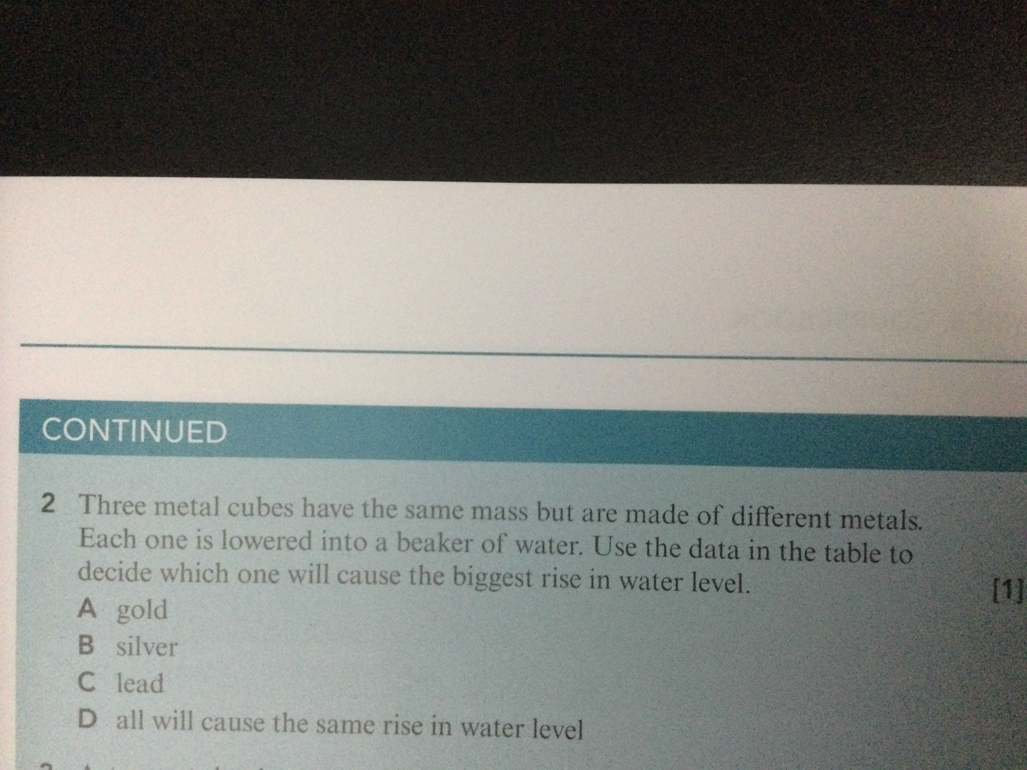 CONTINUED
2 Three metal cubes have the same mass but are made of diffe