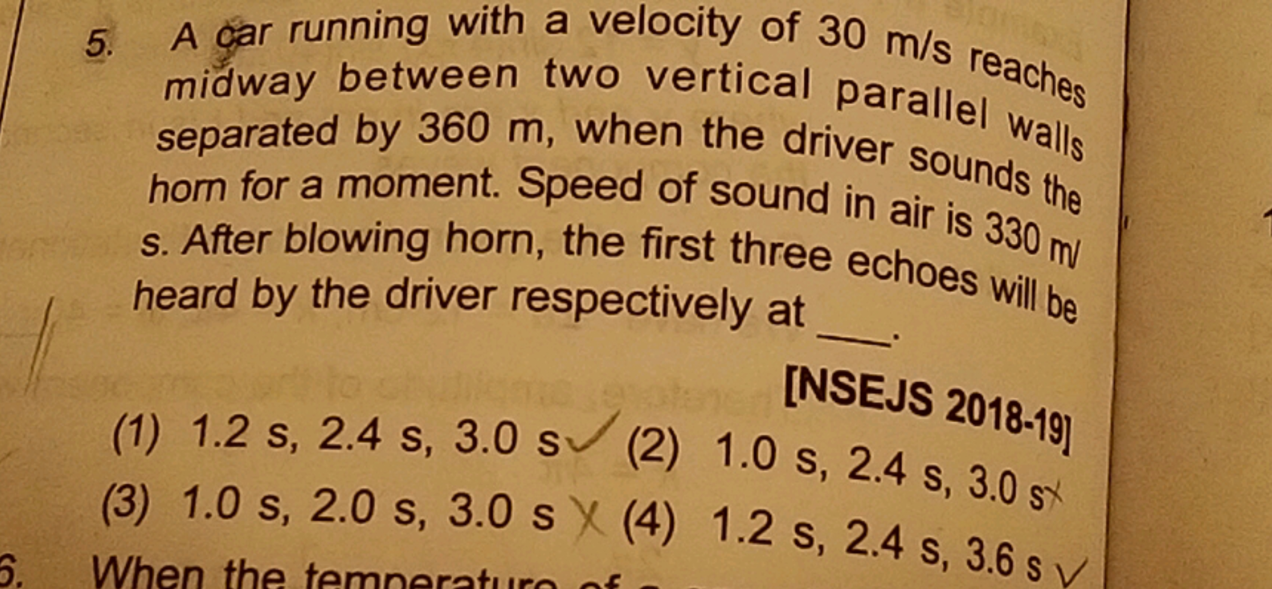 5. A gar running with a velocity of 30 m/s reaches midway between two 