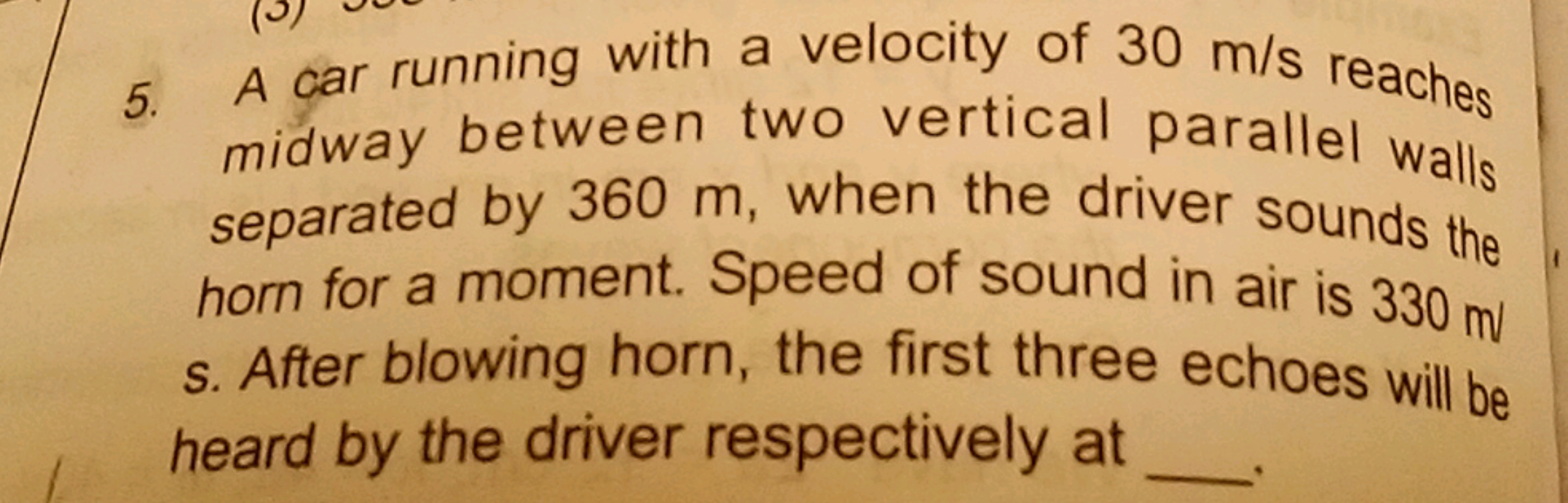 5. A car running with a velocity of 30 m/s reaches midway between two 