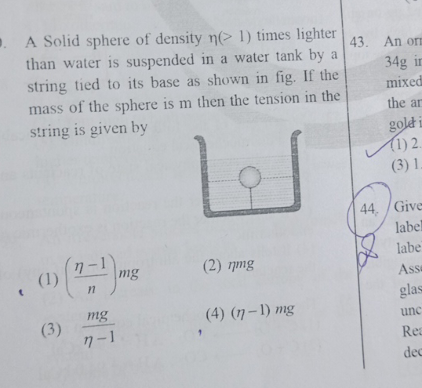 A Solid sphere of density η(>1) times lighter than water is suspended 