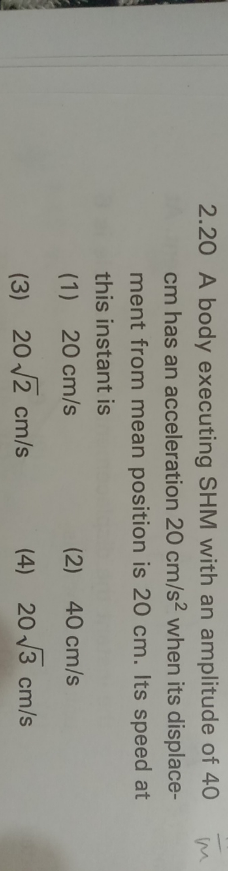 2.20 A body executing SHM with an amplitude of 40 cm has an accelerati