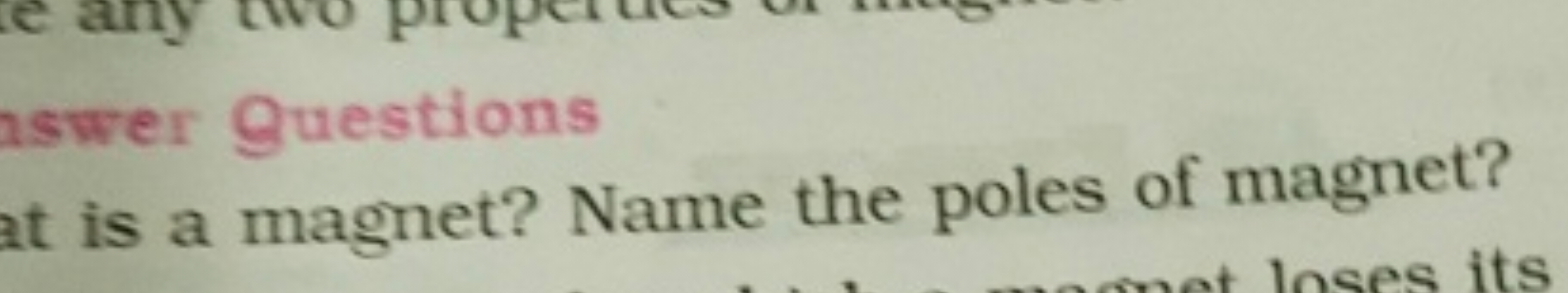 nswer Guestions
at is a magnet? Name the poles of magnet?