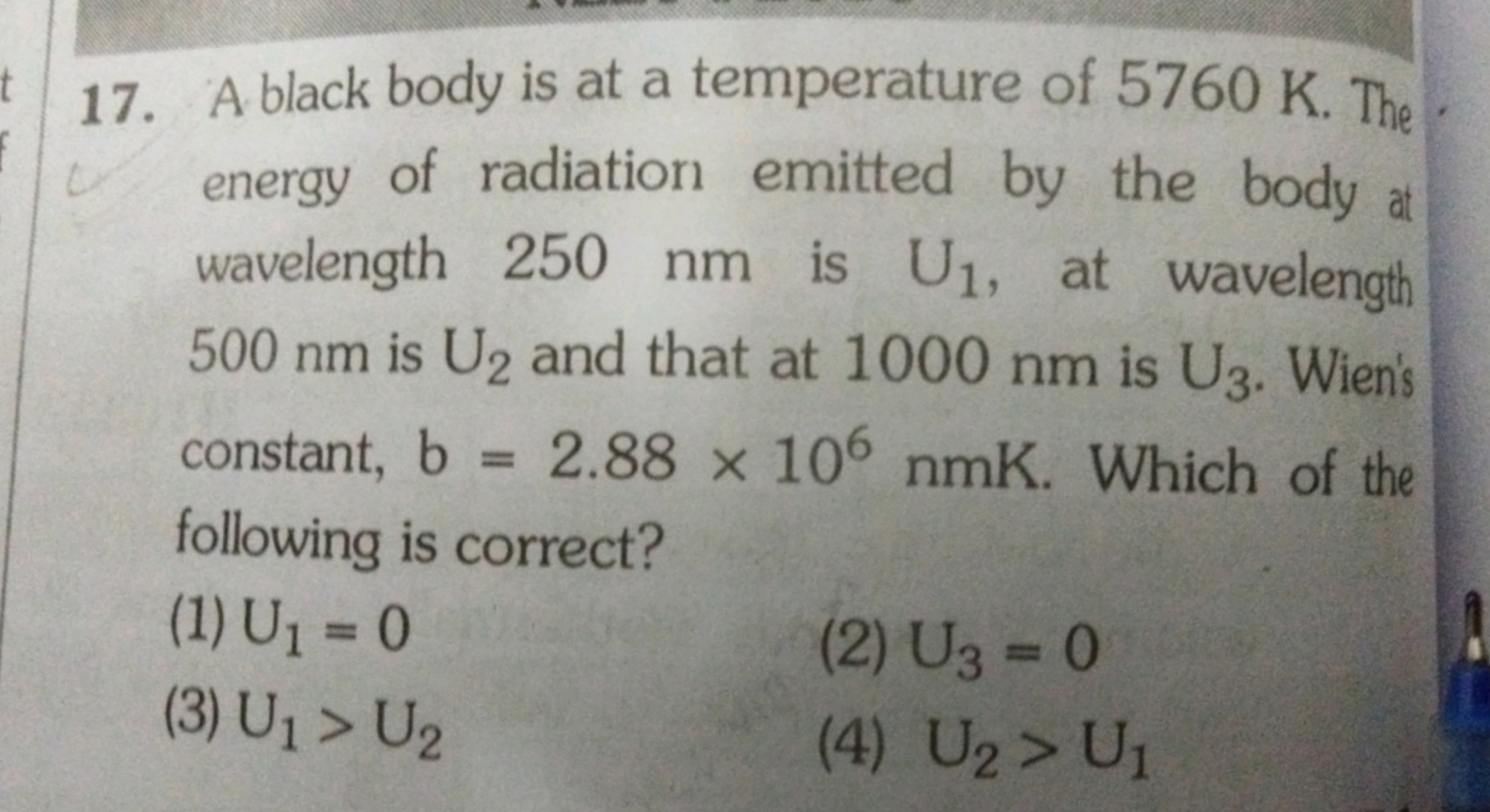 17. A black body is at a temperature of 5760 K . The energy of radiati