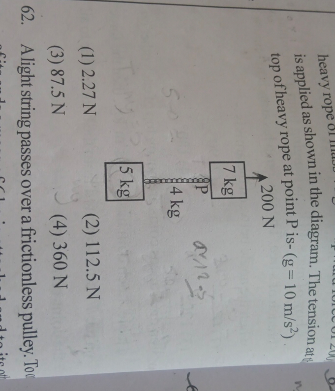 is applied as shown in the diagram. The tension att top of heavy rope 