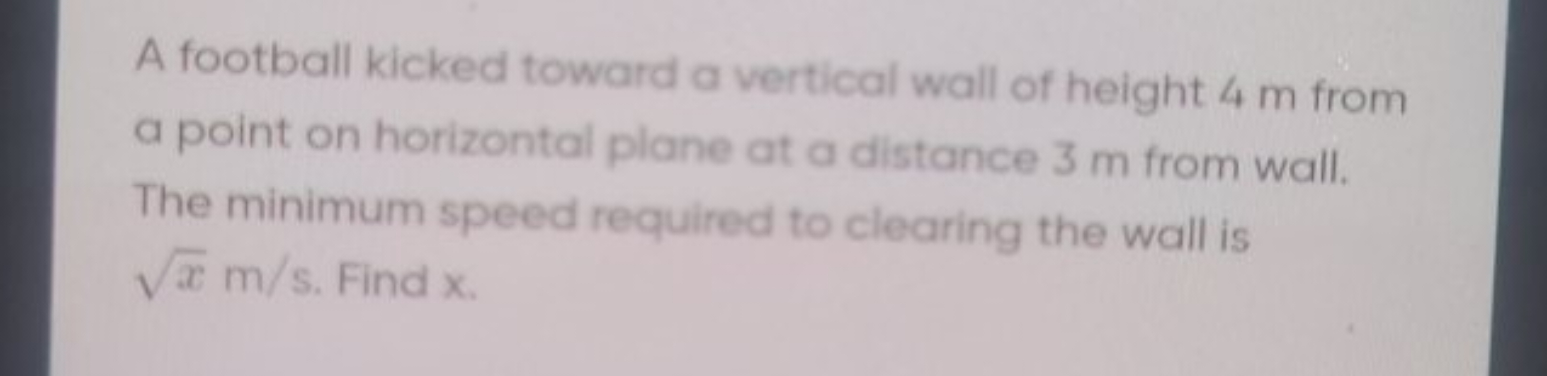 A football kicked toward a vertical wall of height 4 m from a point on
