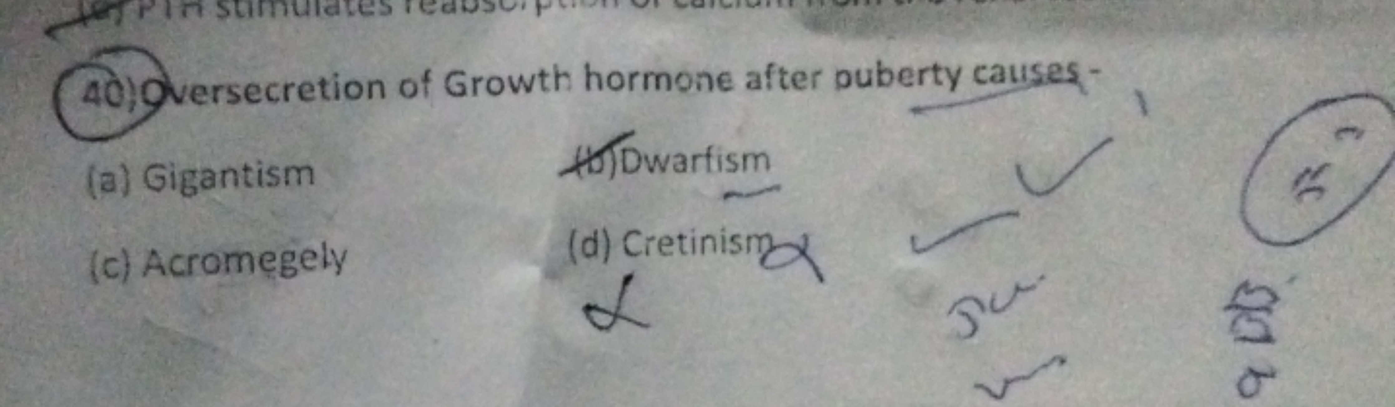 40) Quersecretion of Growth hormone after ouberty causes-
(a) Gigantis