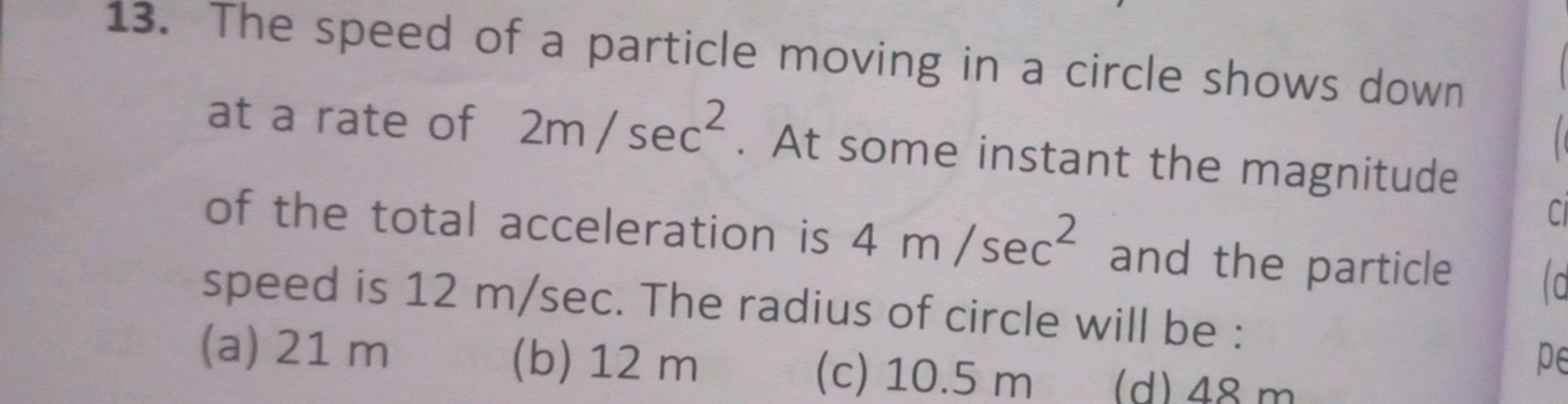 13. The speed of a particle moving in a circle shows down at a rate of